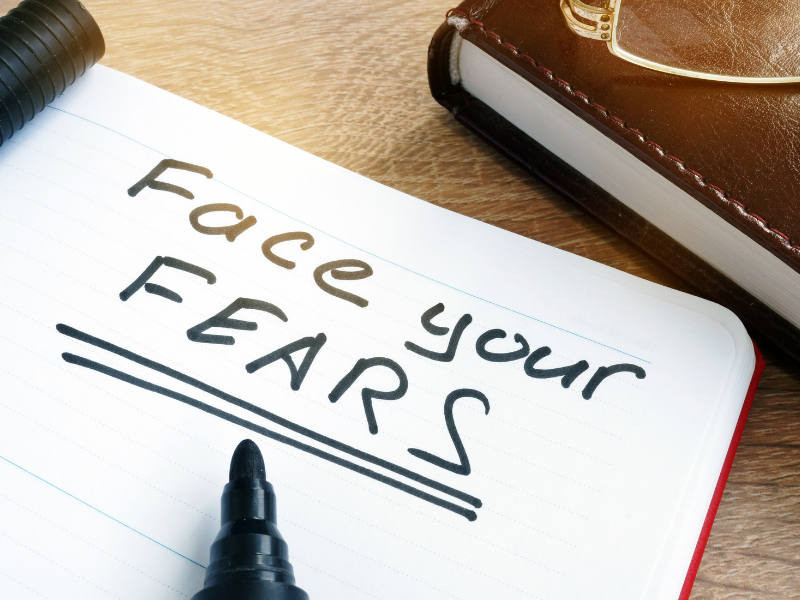 face your fears written on a pad