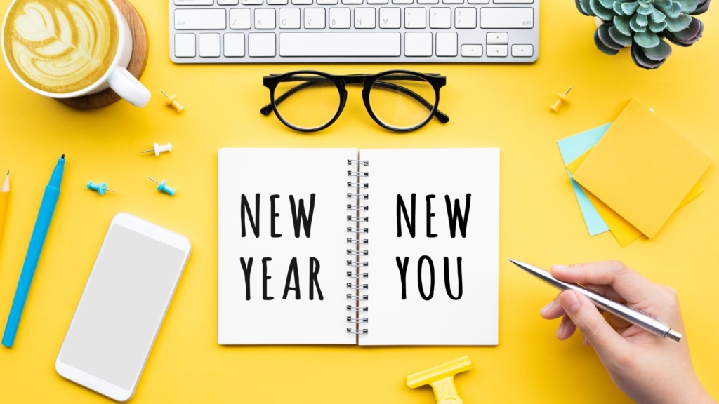 new year new you text on desk